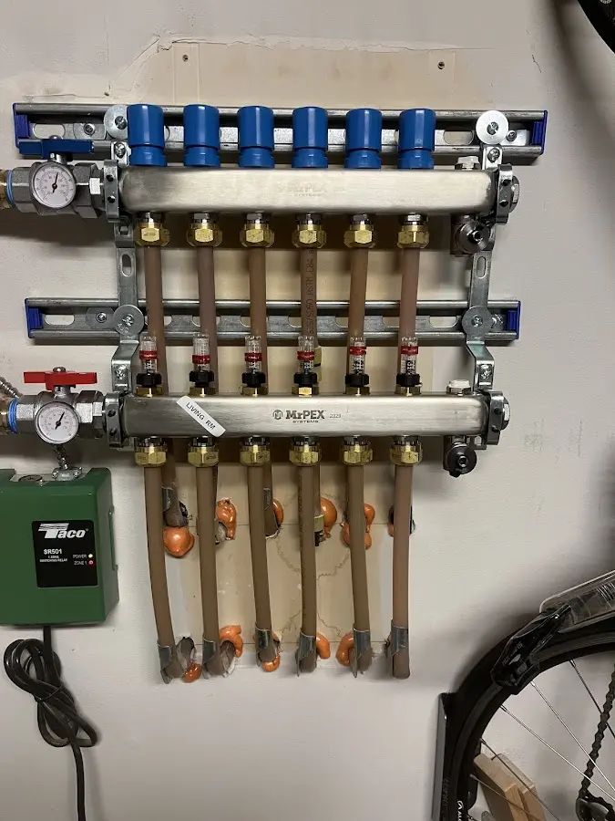 Plumber performing Gas Leak Detection at a residential property in Masonville